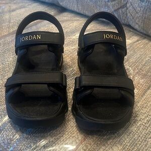 Jordan Black Sandals with Gold Accents